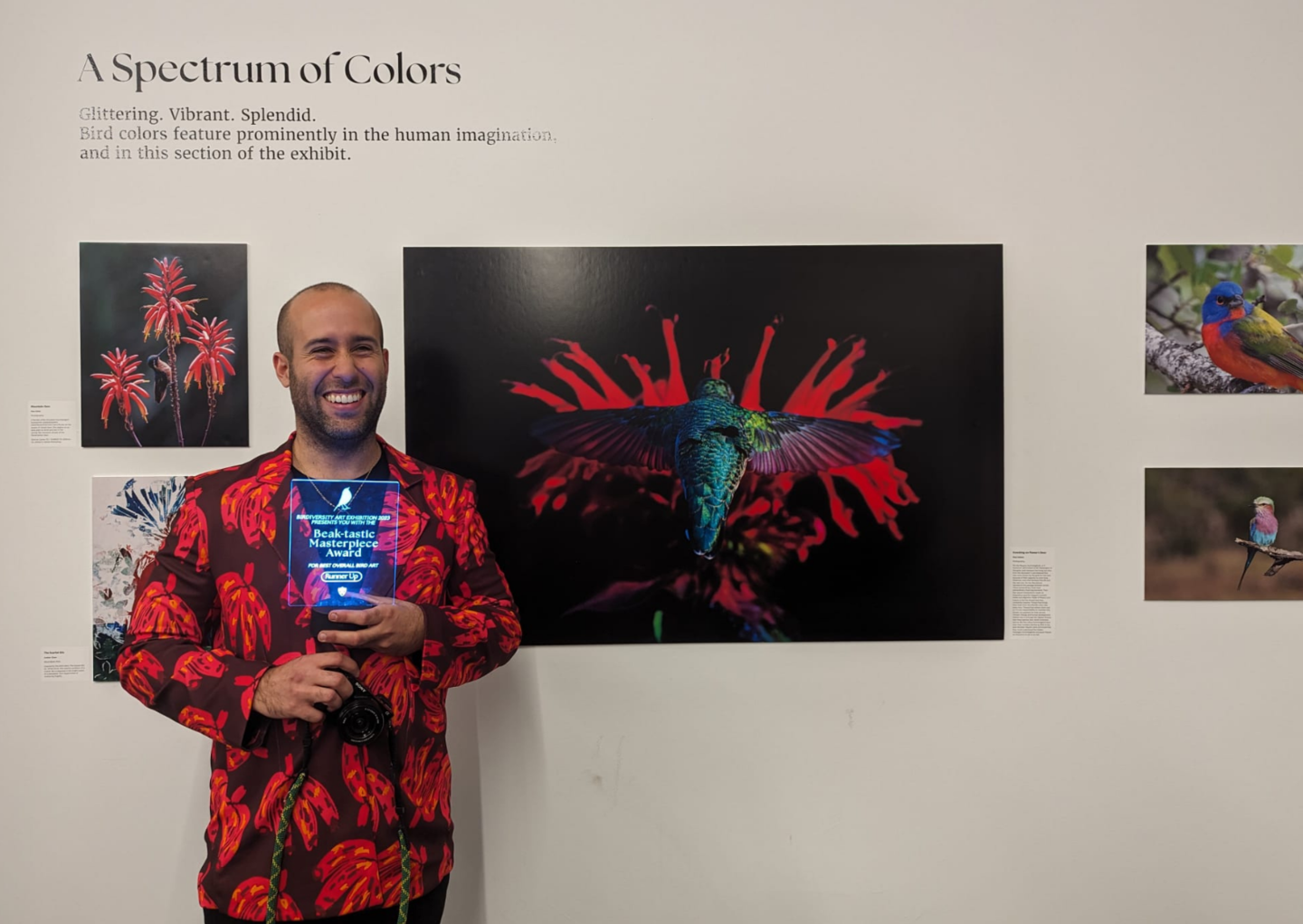 an award recipient with their trophy in front of their BirDiversity submission